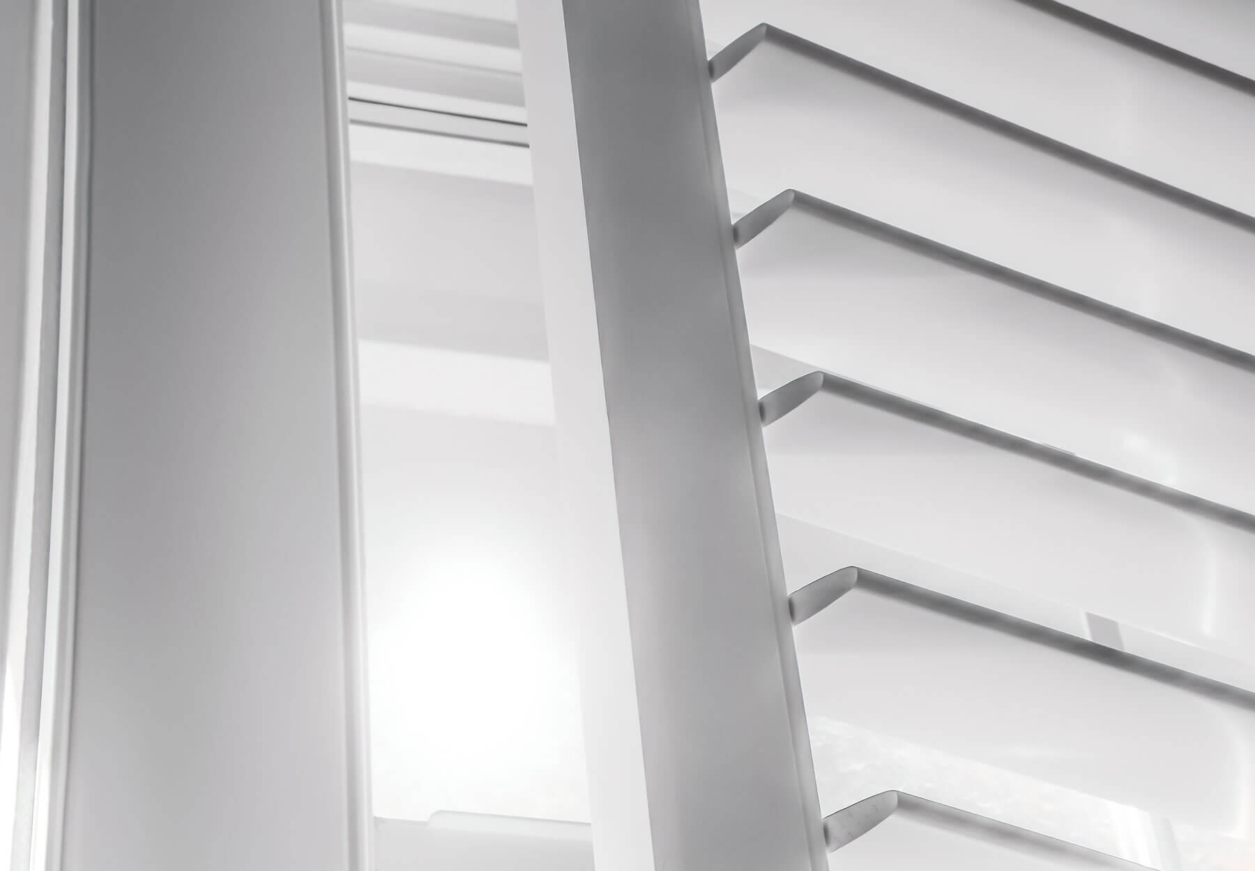 A close-up of vinyl shutters